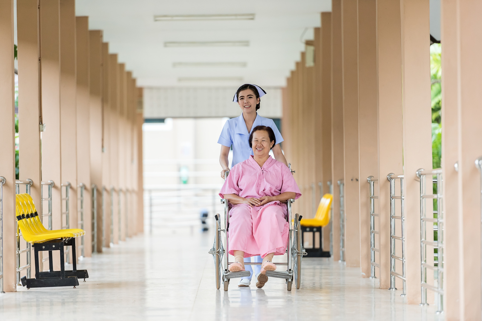 Nurse Caring for Patient in a Wheelchair